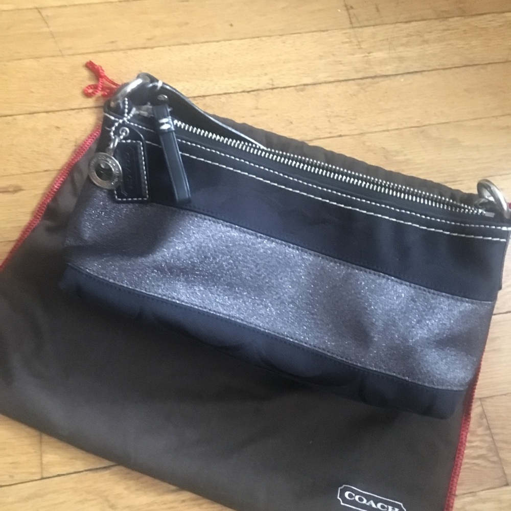 Small signature canvas and metallic Coach baguette bag